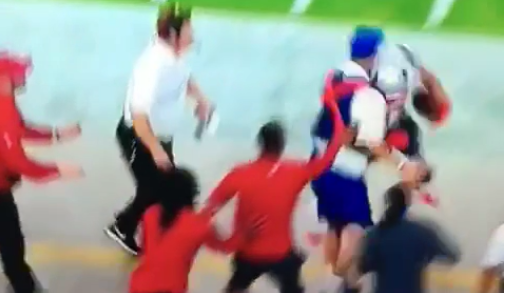 Julian Edelman crashes into a ball boy during Sunday Night Football