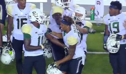 Baylor's kicker shoves his own teammate on the sidelines