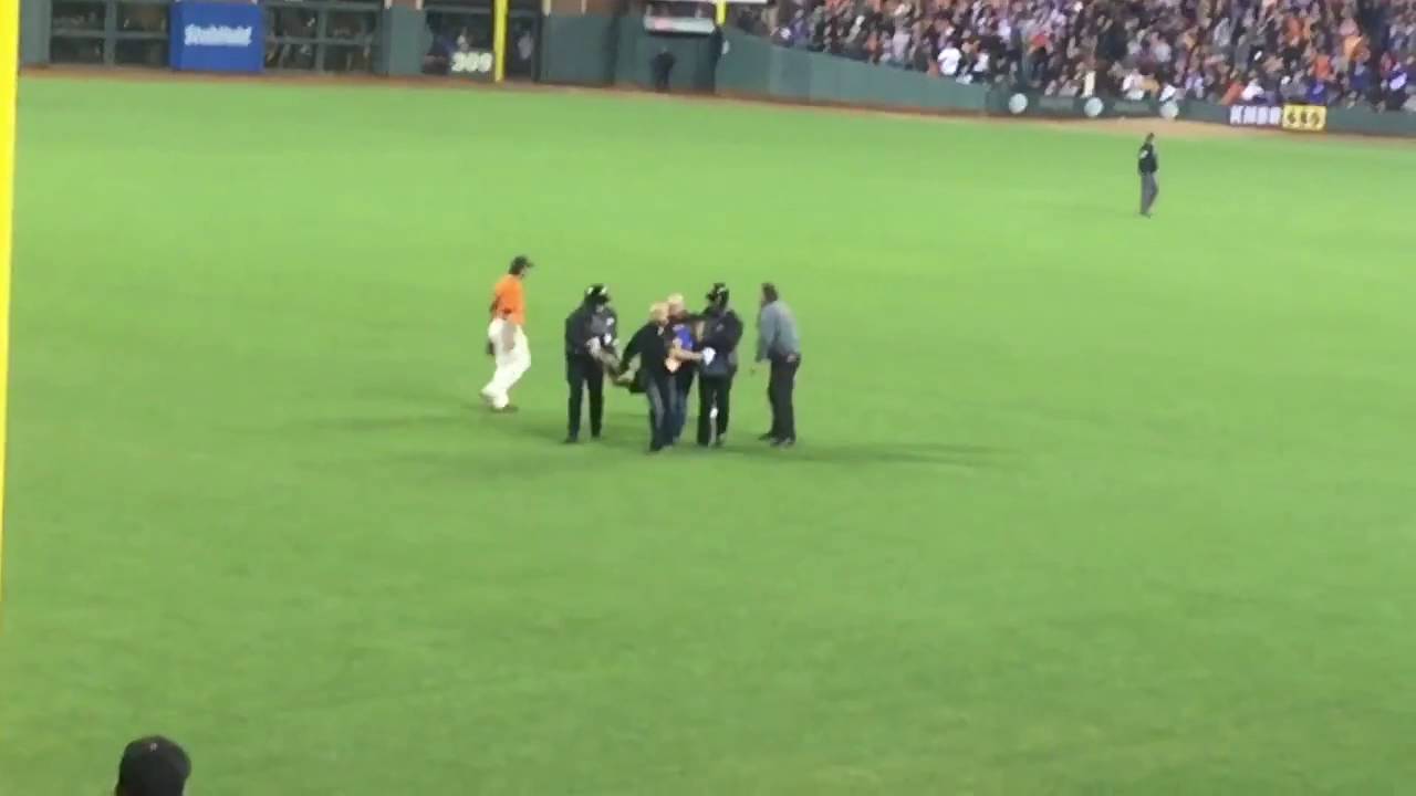 Angel Pagan suplexes a fan on the field at the Giants game