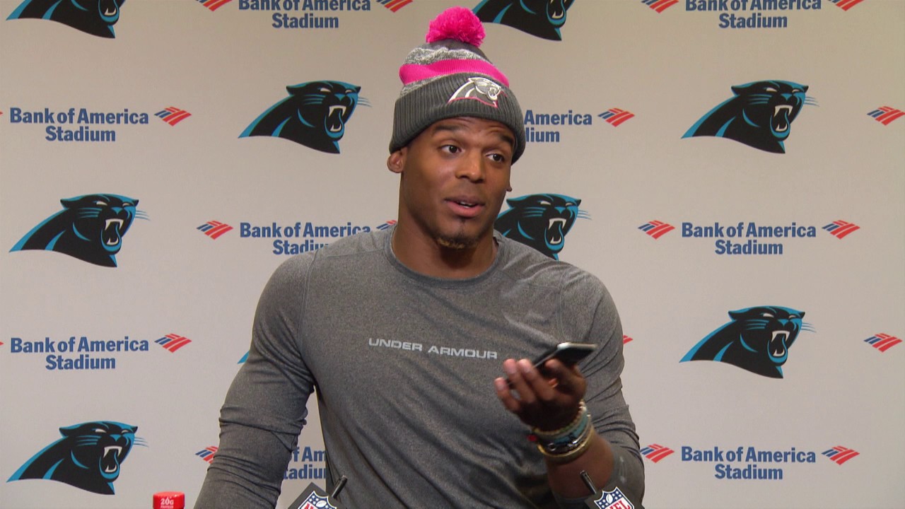 Cam Newton answers reporters phone during press conference