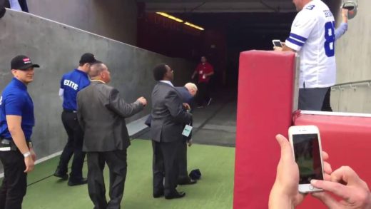 Fan hits Jerry Jones in the head with Cowboys helmet