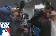 Bill Murray chugs champagne with Cubs president Theo Epstein
