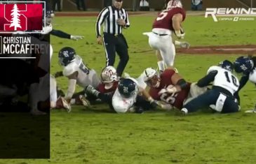 Christian McCaffrey leaps over his own teams offensive line