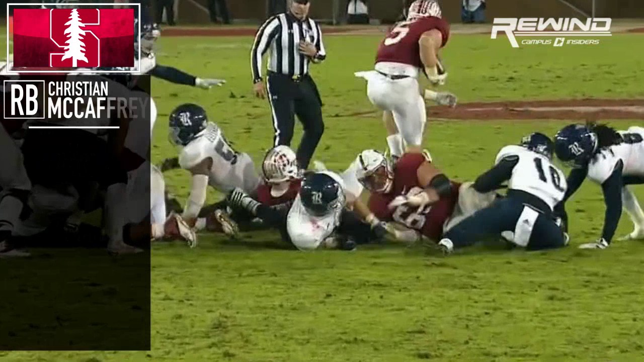Christian McCaffrey leaps over his own teams offensive line
