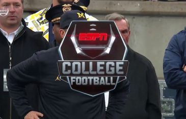 Jim Harbaugh breaks his head set in a fit with the officials