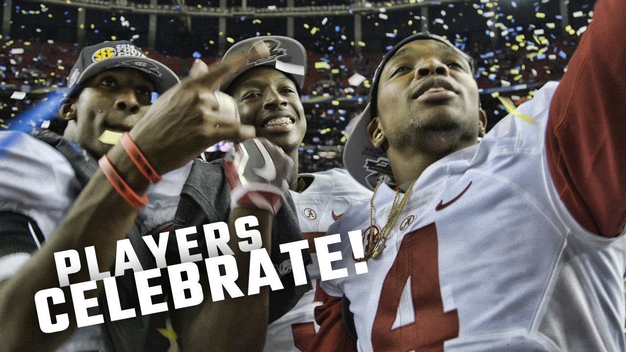 Alabama players celebrate on the field after becoming 2016 SEC Champions