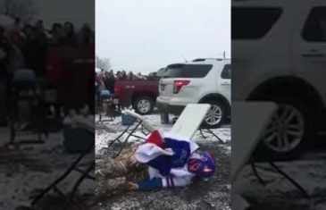 Bills fan gruesomely breaks his leg jumping onto a table (Warning: Graphic)