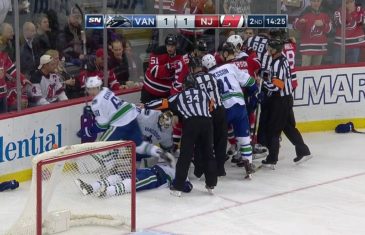 Canucks & Devils brawl while Philip Larsen is knocked out unconscious