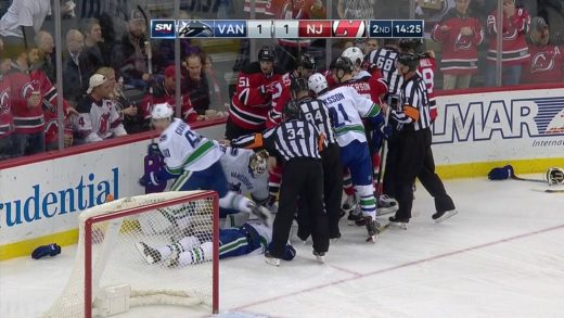 Canucks & Devils brawl while Philip Larsen is knocked out unconscious