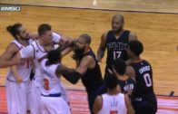 Kristaps Porzingis pushes Marquese Chriss after being shoved to the floor