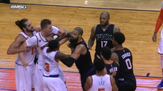 Kristaps Porzingis pushes Marquese Chriss after being shoved to the floor