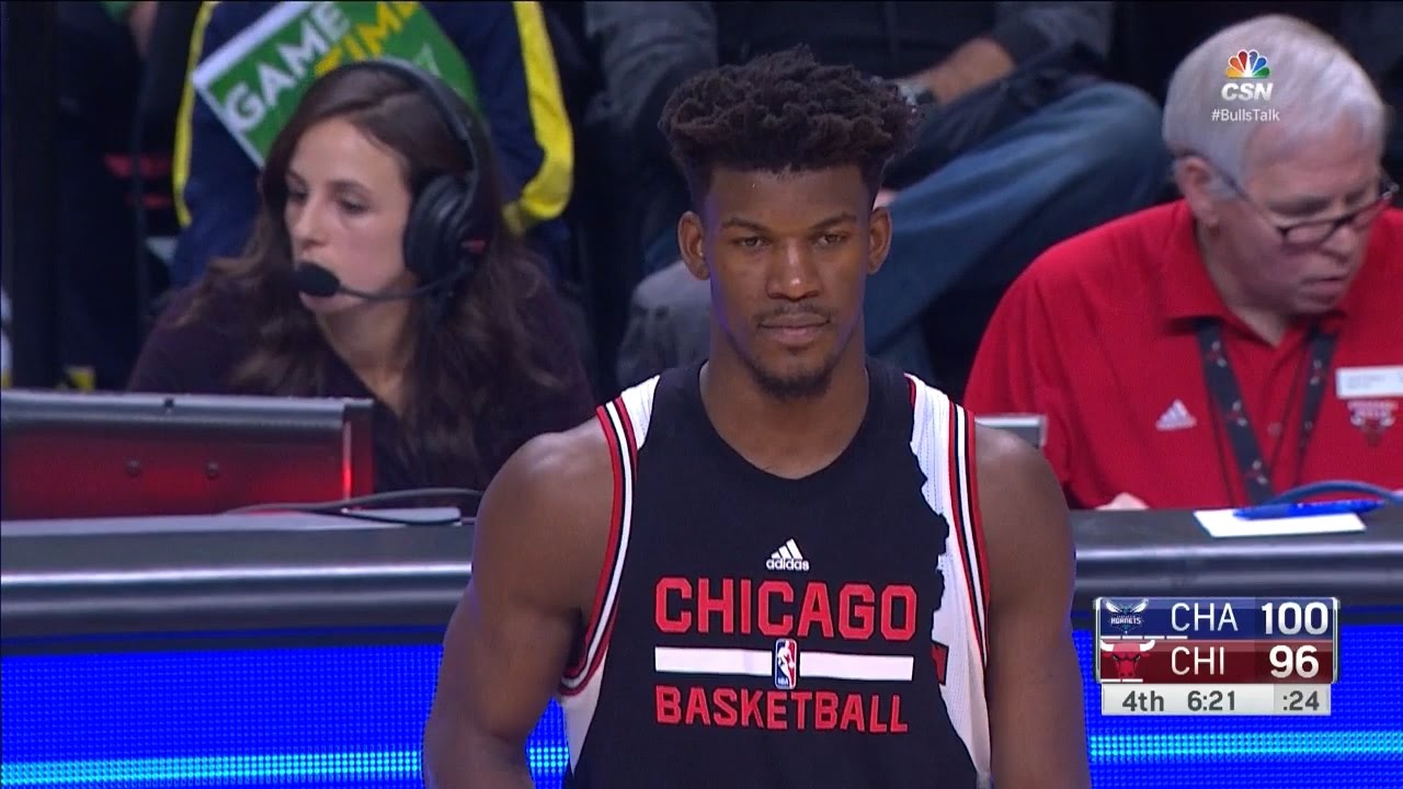 Jimmy Butler forgets to remove his ripped warm up shirt