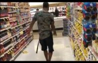Raiders punter Marquette King punts food at a grocery store