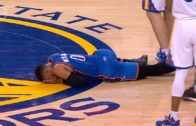 Zaza Pachulia stands over Russell Westbrook after knocking him over