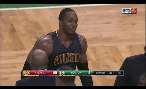 Dwight Howard pushes Al Horford causing a scrum to ensue