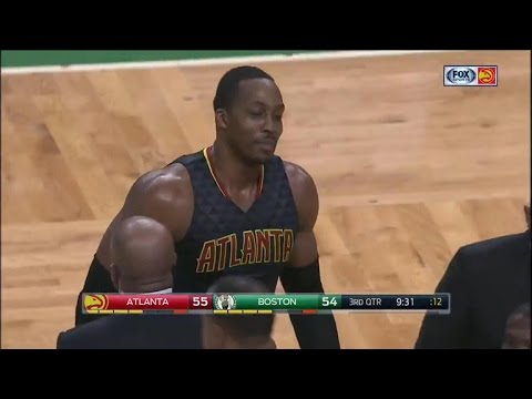 Dwight Howard pushes Al Horford causing a scrum to ensue
