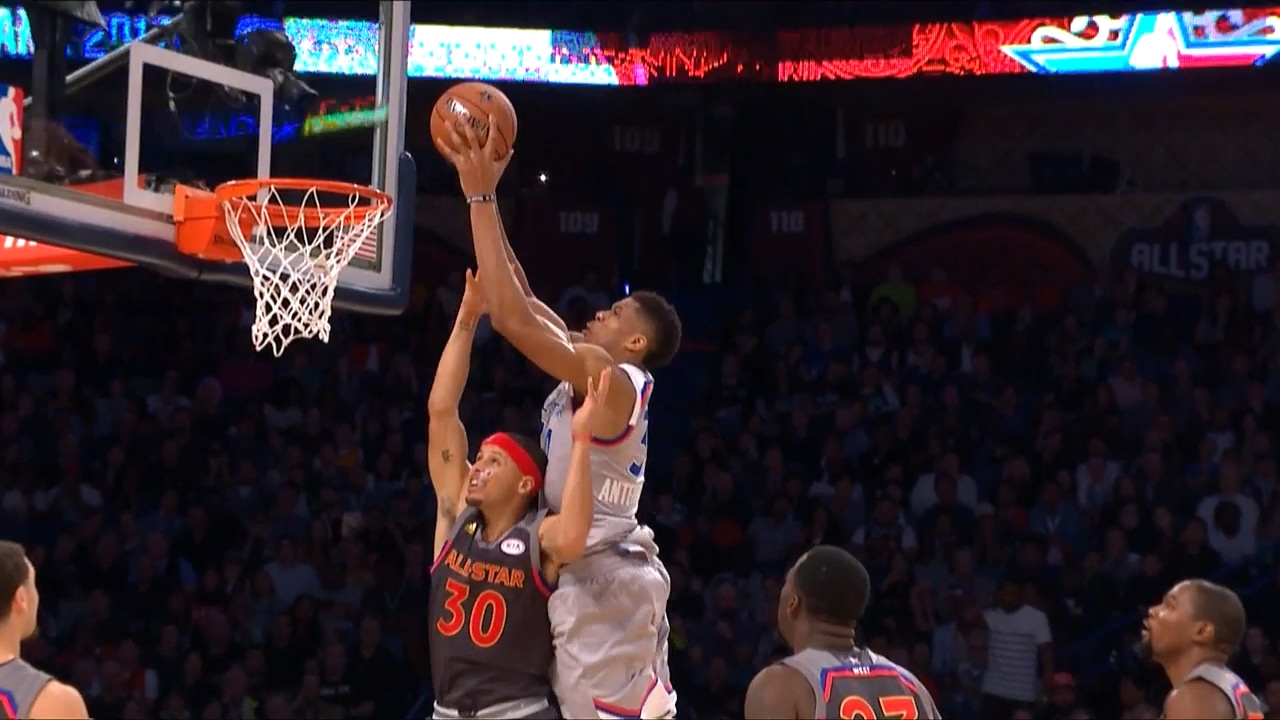 Giannis Antetokounmpo posterizes Steph Curry on a put back slam