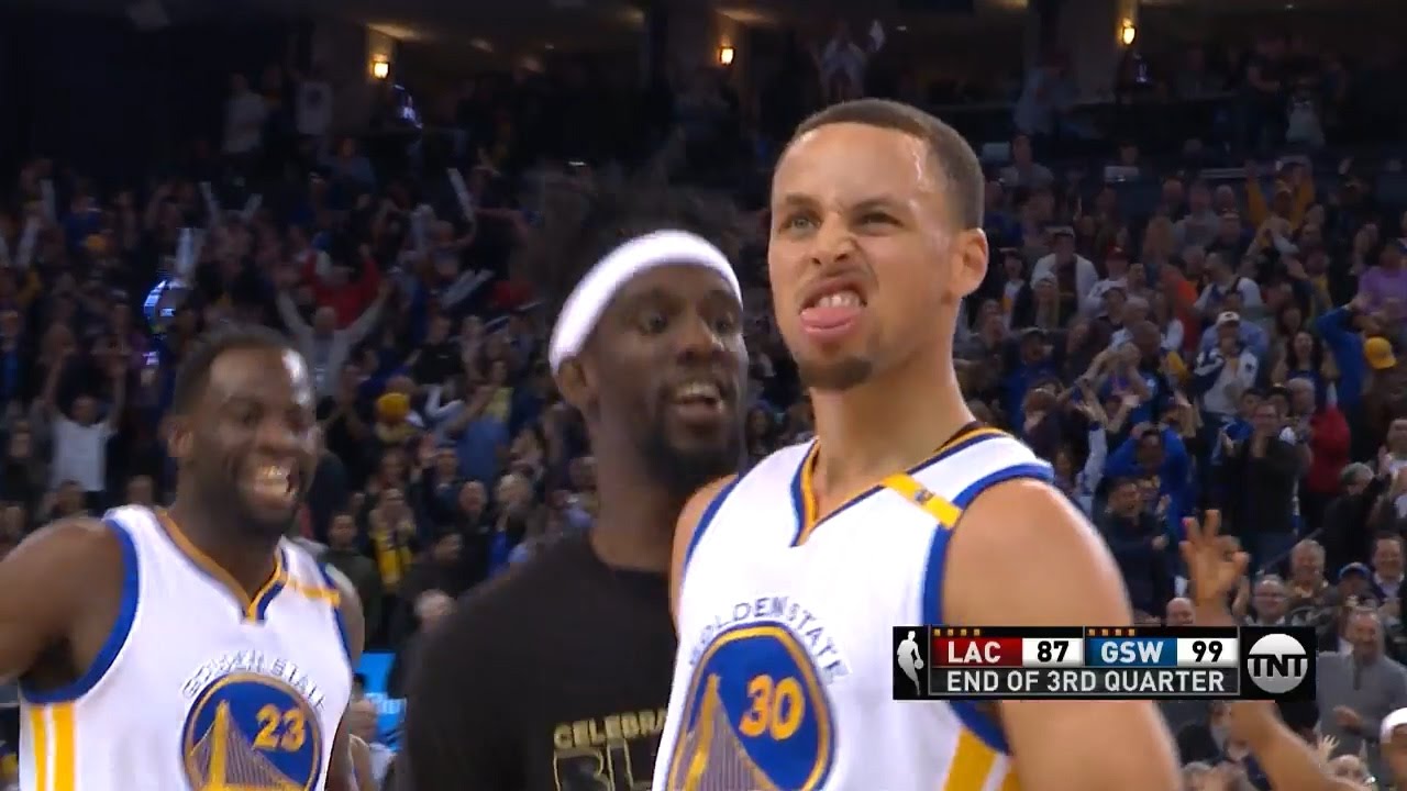 Stephen Curry banks in a deep buzzer beater