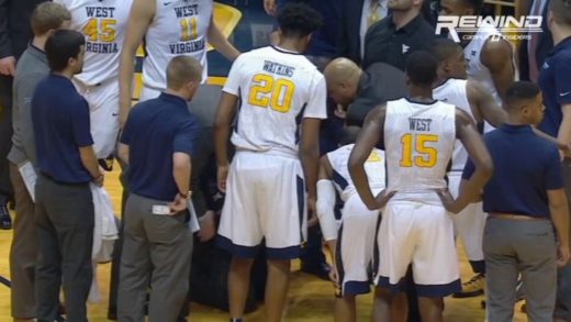 West Virginia’s head coach Bob Huggins collapses before half time