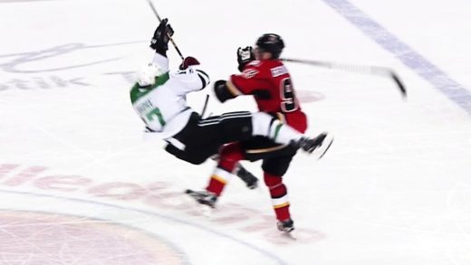 Calgary’s Sam Bennett levels Dallas’ Devin Shore with a massive hit