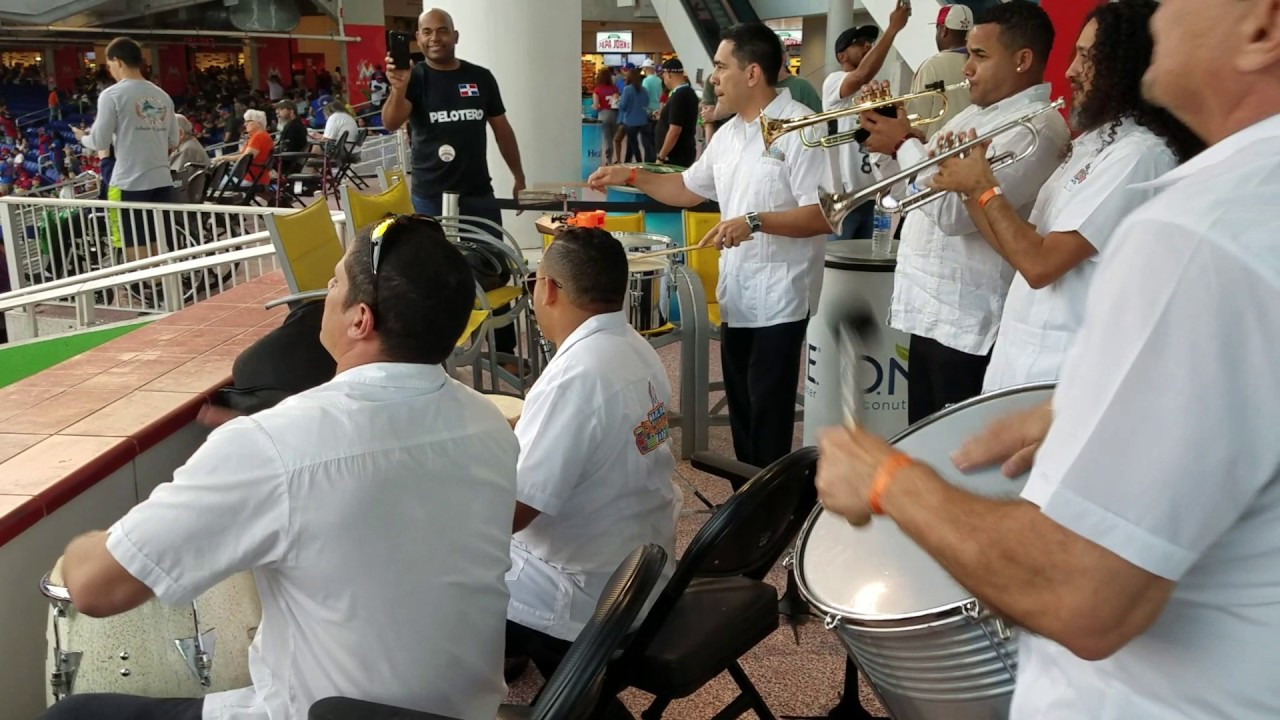 Marlins staff play the drums at Dominican Republic WBC game