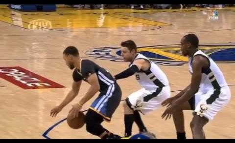 Stephen Curry gets shoved out of bounds by Mathew Delladova