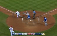 Chris Coghlan jumps over Yadier Molina in full Willie Mays Hayes mode
