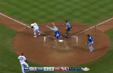 Chris Coghlan jumps over Yadier Molina in full Willie Mays Hayes mode