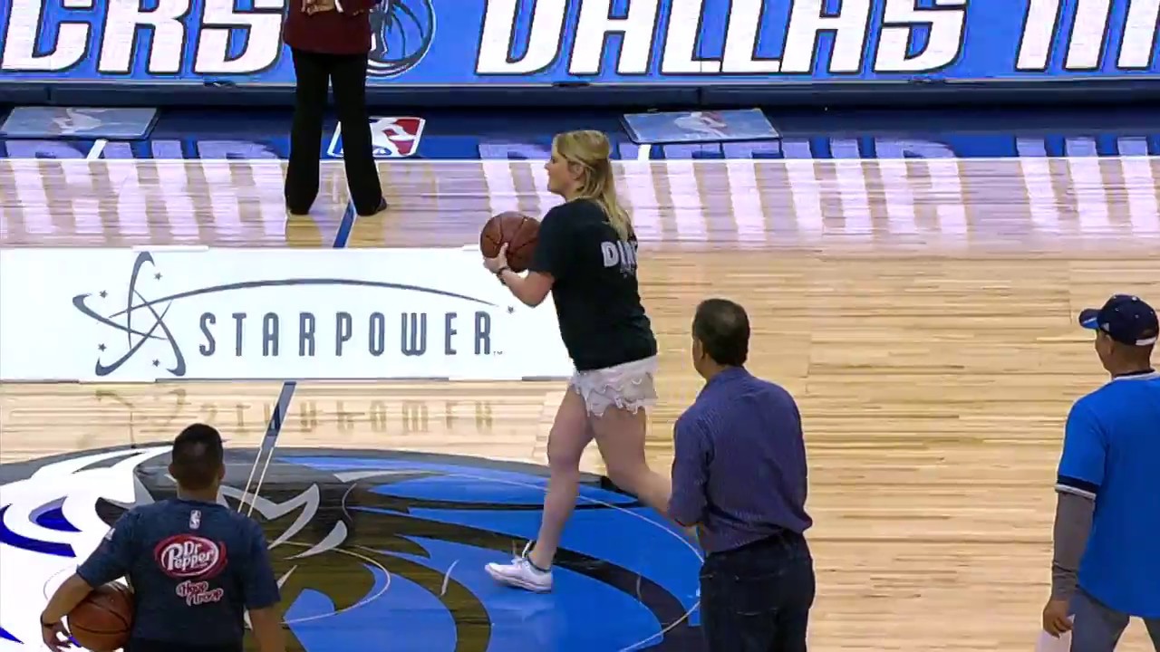 Dallas Mavericks fan hits half court shot in Dirk Nowitzki shirt