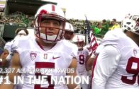 Christian McCaffrey gets tackled by a ref during Stanford vs. Washington