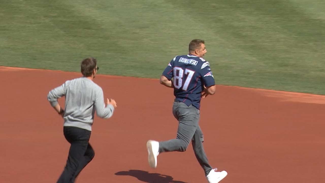 Rob Gronkowski steals Tom Brady's jersey during Red Sox Opening Day