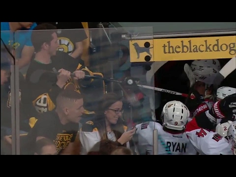 Salty Bruins fan tries to steal Ottawa Senator players stick after loss