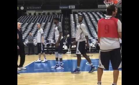 Tony Romo scores in practice with the Dallas Mavericks