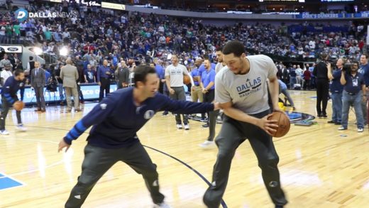 Tony Romo warms up with the Dallas Mavericks