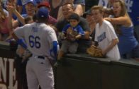 Yasiel Puig attempts to give a young fan a ball 2 times, 3rd time is the charm