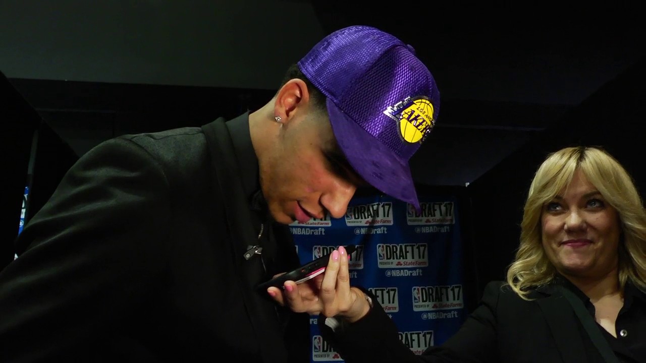 Lonzo Ball speaks with Magic Johnson after being drafted by the Lakers