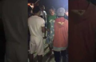 Manny Pacquiao hands out money to locals in the Philippines