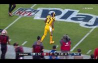 Robert Woods tip-toes in bounds during backward catch