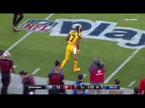 Robert Woods tip-toes in bounds during backward catch