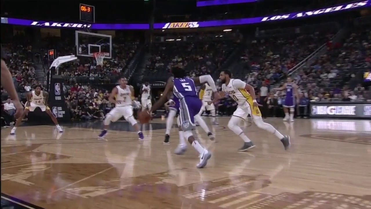 De'Aaron Fox bursts to the rim and finishes over Julius Randle