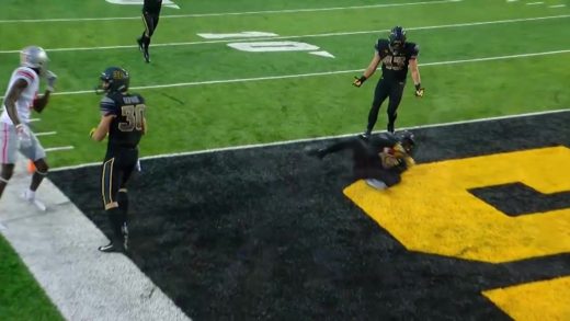 Iowa’s Joshua Jackson intercepts J. T. Barrett with one hand