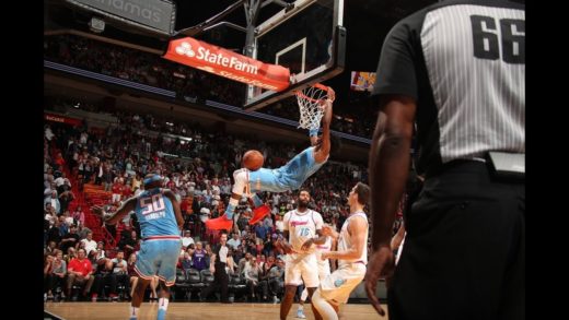 De’Aaron Fox soars over the defense for the game-winning put-back dunk