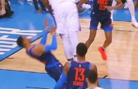 Joel Embiid stuffs one home over Russell Westbrook
