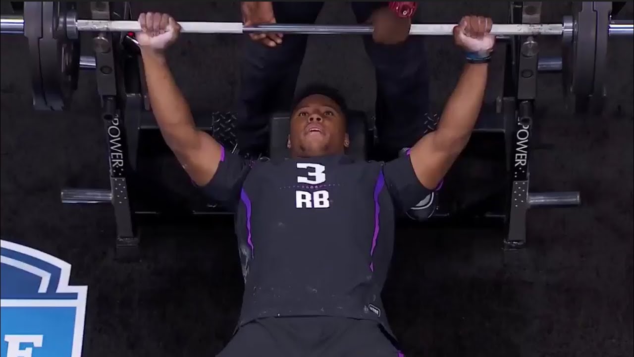 Saquon Barkley puts in work on the bench press before the combine