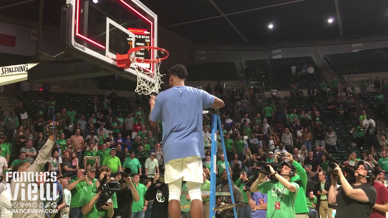 UNT cuts down the net after taking home the CBI Championship